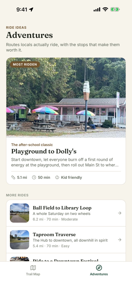 The Adventures tab listing curated rides